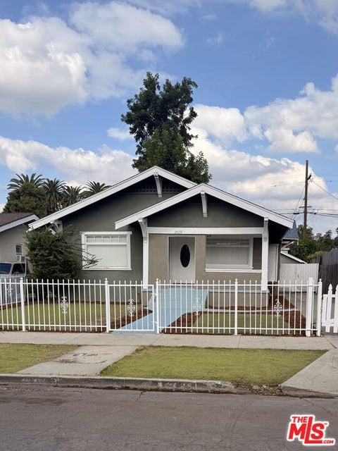 Photo of 2029 W 41st Place, Los Angeles, CA 90062 (MLS # 26830415)