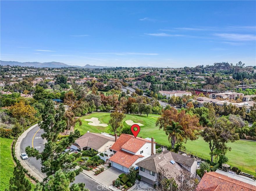 BREATHTAKING HILLS AND GOLF COURSE VIEWS from this gorgeous, super bright home in one of the most sought after and established neighborhoods in the heart of Mission Viejo located in A SINGLE LOADED STREET.  Experience modern living, showcasing MULTI-USE DOWNSTAIRS ROOM with built-in shelves ideal as a BEDROOM OR OFFICE WITH SLIDING DOOR OPENING TO THE BEAUTIFUL BACKYARD. 

As you enter this beauty, you are greeted with a breathtaking home offering BRAND NEW FLOORING AND ABUNDANCE OF WINDOWS leading to an impressive LIVING ROOM WITH FIREPLACE AND FORMAL DINING ROOM.  

Boasting AN ENORMOUS BRIGHT FAMILY ROOM boasting fireplace, built-in cabinets, NEW LAMINATE WOOD FLOORS and sliding door opening to the most AMAZING EXPANSIVE BACKYARD.  Come explore your inner chef in the gourmet kitchen equipped with A WINDOW TO THE MOST AMAZING VIEWS OF GOLF COURSE AND HILLS, abundance of light, custom backsplash and quartz countertop, stainless steel appliances, built in Microwave, and center island. 

RELAX AND ENTERTAIN IN YOUR ENORMOUS PRIVATE BACKYARD, offering BREATHTAKING PANORAMIC VIEWS and covered patio ideal for relaxing, and A TRUE SYMBOL OF ZEN LIVING —DESIGNED FOR ULTIMATE RELAXATION. 

There are extensive upgrades throughout, including FRESH CUSTOM PAINT, NEW CARPET, NEW LAMINATE WOOD FLOORS, updated light fixtures, wainscoting, indoor laundry room with cabinets and much more. The GRAND PRIMARY BEDROOM offers two walk-in closets, soaking tub, YOUR PRIVATE DECK WITH PANORAMIC GOLF COURSE VISTAS, a serene spot to unwind any time of the day. 

The 3 car attached garages offer epoxy floors. Newer washer, dryer and fridge included. 

Located within the award-winning Saddleback Valley Unified School District. This rare find provides access to the updated neighborhood Playground, AND LAKE MISSION VIEJO MEMBERSHIP. and is minutes from The Shops at Mission Viejo, Providence Mission Hospital, and top-rated beaches in Dana Point and Laguna.
