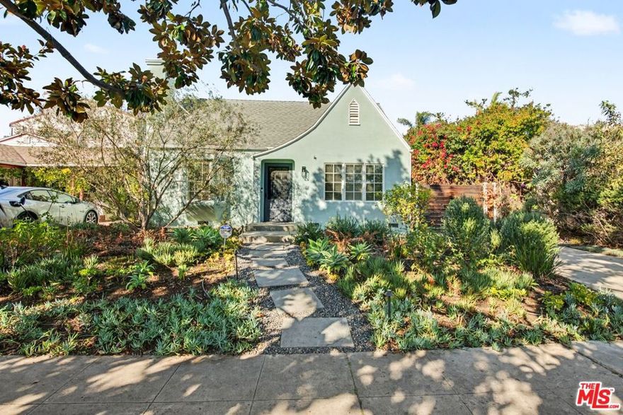 Classic 3 bed/3 bath 2-story French Country Style home with incredible updates and character on desired Westwood tree-lined street. Beautifully landscaped front yard with lemon tree and slate-tiled walkway. Filled with natural light, living room with charming front bay window, tall coved ceiling and decorative fireplace opens to spacious dining room.  3 bedrooms including 2 bed/2 bath downstairs, with updated bathrooms and primary suite upstairs with beautiful treetop views through large windows, newly remodeled contemporary full bath with dual basins, soaking tub and shower, and a spacious custom built walk-in closet. Remodeled kitchen with newer quartz countertops, butcher-block breakfast bar, stainless steel appliances with gas range/oven including griddle and large glass front cabinets. Sun-filled entertainer's family room with ceramic tiled flooring, built-ins, and bar with cabinets, all opening with sliding door to backyard patio with veranda, built-in heat lamps and patio table, and privately landscaped yard with stone gravel, mature garden and fruit trees, detached garage with auto door and gated driveway. Additional features include central ac/heat, hardwood flooring, dual pane windows throughout, plantation shutters, newly painted interior, Ideal proximity to Rancho Park Golf Course and Rec Center/Park, Pico Blvd. retails and restaurants, Westfield Century City Mall, Beverly Hills and UCLA. Westwood Charter School. Available immediately!