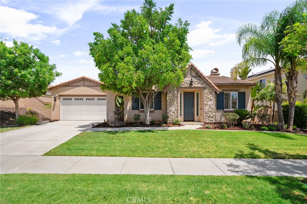 Experience luxurious single-story living in this spacious home within Corona's prestigious, guard-gated community of The Retreat. Elegant tile flooring graces the entry, and a gourmet kitchen features granite countertops, a large island, and rich wood cabinetry. Relax by one of four fireplaces, including one in the inviting living room and another on the private patio. Enjoy enhanced privacy and sophisticated style with shutters on windows and doors throughout. The master suite offers distressed wood floors, a fireplace, a walk-in closet, and a spa-like bath with dual sinks, a separate jet tub, and a shower. Additional versatile spaces include a dedicated office and comfortable bedrooms.
Beyond the home, residents of The Retreat enjoy exclusive access to exceptional community amenities, including a community pool, a cozy fire pit perfect for gatherings, and a fun playground. This is a truly remarkable property designed for sophisticated comfort, security, and a vibrant community lifestyle.