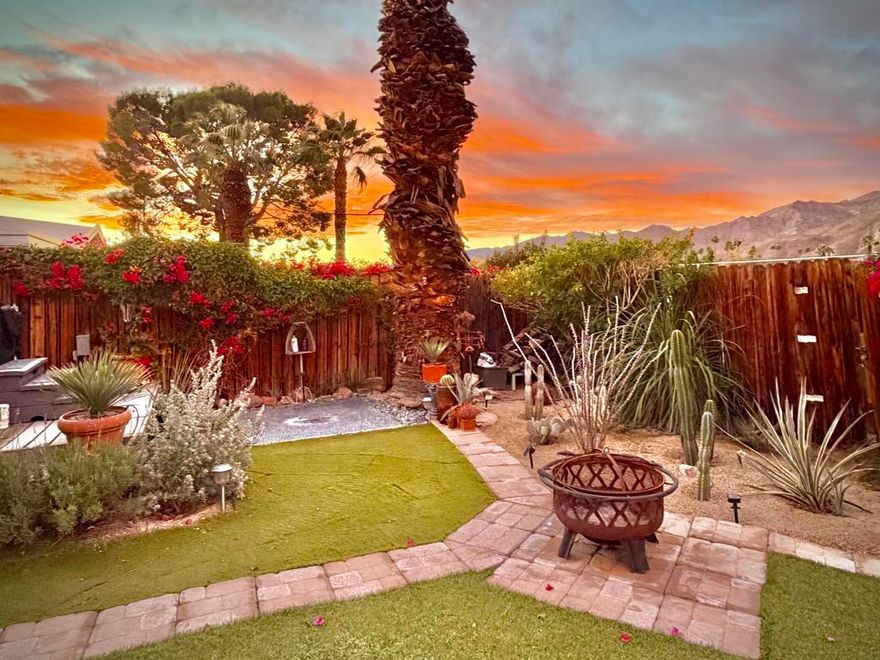 Enjoy a blissful spa experience at home at this exceptional desert haven with jaw-dropping panoramic mountain views. In a tranquil, private corner of Date Palm Country Club is a 2 bedroom, 2 bathroom home like no other. Highlighted by striking desert landscaping and lush fruit trees, the exceptionally serene back yard boasts a new hot tub/spa, an outdoor shower, and fire pit with an emphasis on privacy.  Imagine waking up every morning to savor your coffee in the garden or taking a long soak in the hot tub while enjoying the sunset over the mountains. The inside is warm, spacious and inviting, upgraded with many quality materials throughout. 310 Via Don Benito features gorgeous Saltillo tile flooring, plantation shutters and efficient mini-split cooling & heating. The open kitchen has Corian countertops, a butcher block island, custom cabinets, under-cabinet lighting, and new KitchenAid appliances with air fryer. Both of the bedrooms also feature custom cabinetry to help stay neat and organized. The primary bathroom showcases a beautifully tiled walk-in shower and a Talavera hand-painted sink. New wireless ceiling fans have been installed. The patio's commercial misters can keep you cool in the summer and the standalone workshop/art studio is powered and air conditioned. The property is amply powered by a leased solar system with 38 panels. The inside electrical panel and water heater have been newly upgraded. The landscaping is watered by a drip irrigation system, managed by an advanced Smart sprinkler controller, which self-adjusts to weather conditions. Abundant storage throughout, with an additional powered shed. This warm, inclusive community caters to individuals aged 55 and older and residents have access to fantastic amenities, including a golf course, pickleball and tennis courts, pro shop, three swimming pools, gym equipment, and a restaurant.