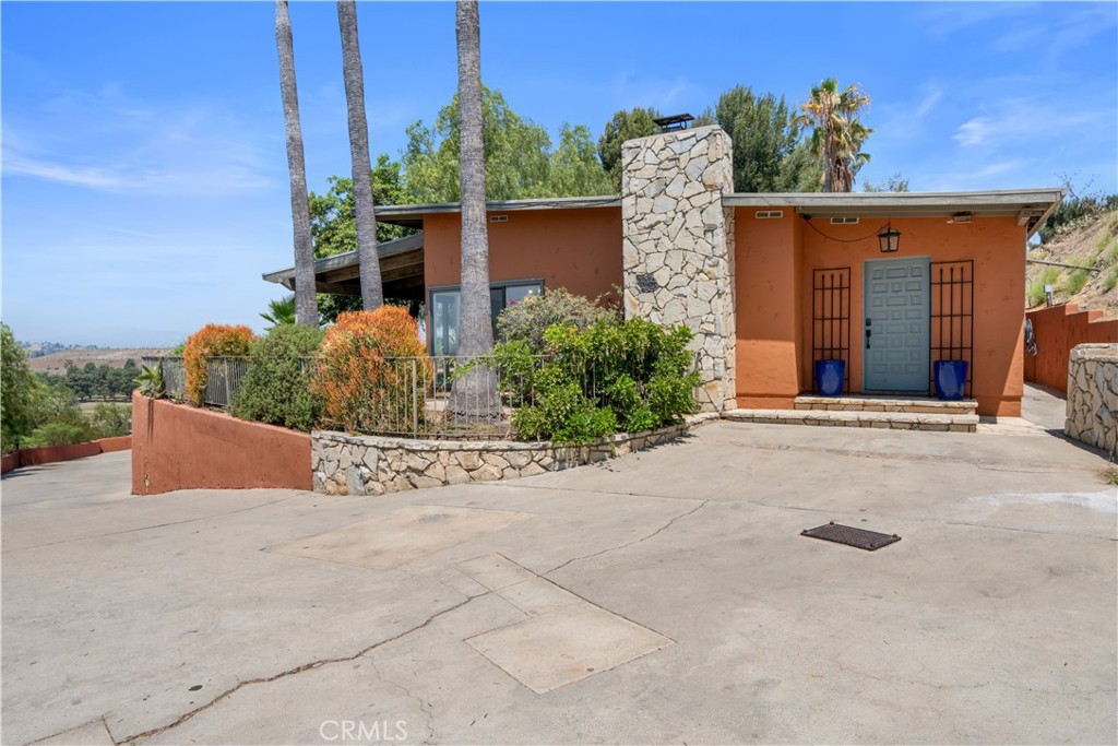 Nestled in the charming equestrian neighborhood of Shadow Hills in Sunland, this exquisite Ranch-style home features four bedrooms and three beautifully remodeled bathrooms and walk-in closets, showcasing thoughtful upgrades throughout. The home is in excellent condition, featuring an updated kitchen that blends modern convenience with timeless design. Adorned with shiny Spanish tile throughout, the interiors exude warmth and character. Impeccably maintained and in pristine condition, this beautiful home sits on a sprawling multi-acre compound, offering breathtaking city views. The property also features a gorgeous Gunite swimming pool, with a stone tile deck, covered patio, lush landscaping and an inviting garden. This property is like a resort, perfect for relaxation or entertaining and beckons a loving and caring tenant. There are horse stables available for boarding, exciting riding and hiking trails, close to many freeways with access to downtown or all areas of the city. Come and experience ranch-style living on this unique compound. Theres excess parking, and storage and an electric car charger, a complete Solar system with full panels that prove to be a great savings and so much more! Pets are allowed. Landlord is an amazing person, and open to discussing splitting the utilities