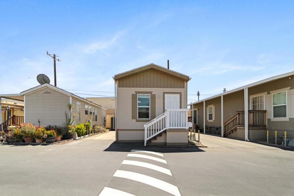 Welcome to this well-maintained 2-bedroom, 1-bath home built in 2018. Home is in extremely clean condition - well-kept by owner. Kitchen Open into Spacious living area. Double-pane windows, newer window AC, and durable laminate flooring throughout. Washer and dryer included for added convenience. Ideal for a small family or first-time buyer, this home offers great value in a convenient location near shopping malls and freeway access. Open House Saturday July 19th From 12PM-3PM.