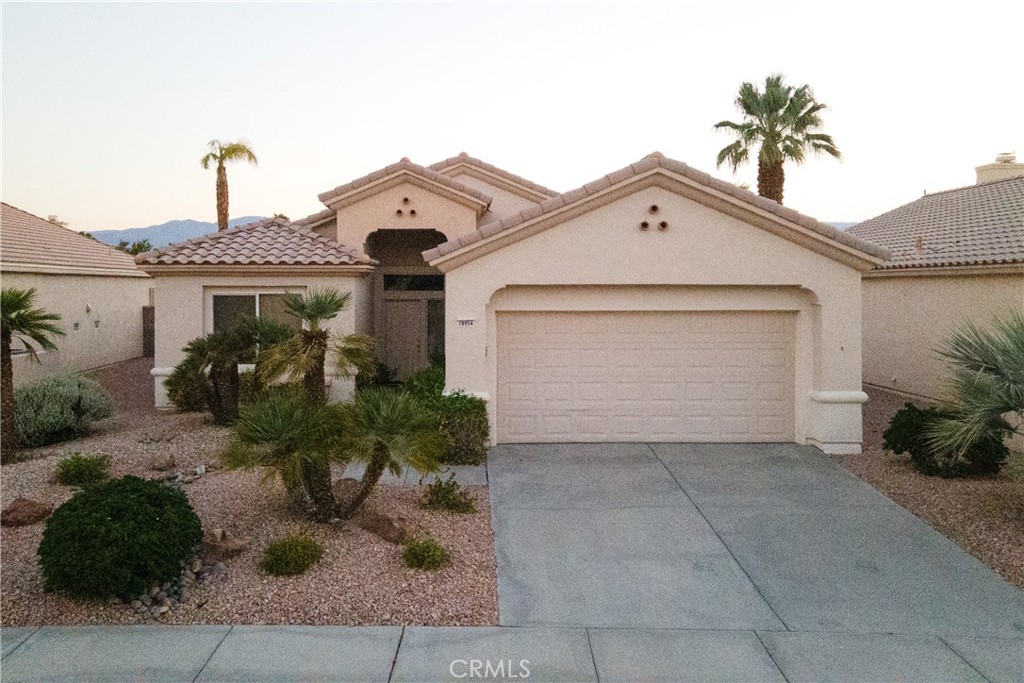 This popular St Maarten model is located in the prestigious area of Sun City, a 55 or better community in Palm Desert. This home is 1664 square feet and boasts two bedrooms and a Den/Office space. With its open-concept design, this model also ensures privacy, as the bedrooms are positioned on opposite ends of the house. The space, layout and open concept make this a very popular model in this community.. The desert landscaping is beautiful and easy to maintain.This home is perfect for the active senior who wants to enjoy all of the amenities this community has to offer, the Recreation center, Golf, Tennis, Walking and so much more.