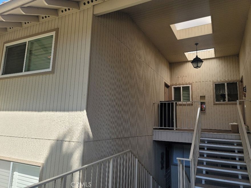 SENIOR COMMUNITY 55+ Fully furnished 2 BEDROOM, 2 BATH "Castilla" model is ready to make it your next home. No expense was spared in the remodel- Beautiful artwork adorns every wall, sunset views from the balcony. The kitchen has QUARTZ countertops, SS appliances-MICROWAVE-Ceiling with recessed lighting, and ample storage-DUAL PANE WINDOWS-LAMINATE FLOORS-CEILING FANS-COVERED BALCONY-WASHER-WAINSCOTING-MIRRORED WARDROBES TWO professional golf courses, a ten-court tennis- an equestrian center, 7 clubhouses, 5 swimming pools, 3 fitness centers- theater- 250 clubs and organizations-Gated community with 24-hour patrols and a private bus system. Only minutes away from Laguna Beach, shopping centers, malls, Saddleback Hospital, and the 5 Freeway.
