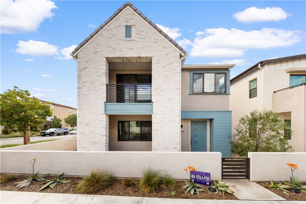 This stunning 4-bedroom, 4-bathroom home is located in the desirable Great Park neighborhood of Irvine, offering modern luxury and comfort. As you step inside, you'll be greeted by an open-concept layout with high ceilings, upgraded flooring and abundant natural light pouring in from large windows, creating a warm and inviting atmosphere throughout. The spacious living room flows seamlessly into the gourmet kitchen, complete with top-of-the-line stainless steel appliances, a large center island, upgraded cabinetry, and sleek quartz countertops. The adjacent dining area offers plenty of space for family meals or dinner parties. The master suite is a true retreat, featuring a spacious walk-in closet and a luxurious en-suite bathroom with dual vanities, a freestanding tub, and a walk-in shower. Each of the three additional bedrooms is generously sized, with ample closet space and easy access to beautifully designed bathrooms. Outside, the backyard is an entertainer's dream, with a fireplace and plenty of room for outdoor activities. Whether you're hosting a gathering or enjoying a quiet evening, this space is perfect for making memories. Other highlights of this exceptional home include a convenient upstairs laundry room, a two-car garage, whole house fan system, solar system and access to top-rated Irvine schools and the incredible amenities of Great Park, including parks, walking trails, and sports facilities.This home truly offers the best of both comfort and style, making it the perfect place for your next chapter.