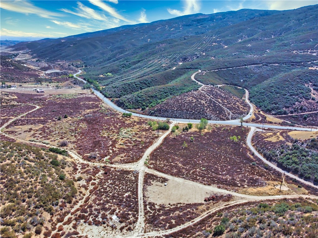 Great investment opportunity with proximity to the rapidly growing City of Leona Valley, Ana Verde, and Palmdale of Los Angeles County! With over 11 acres of residential/Agricultural or recreational lot – This property with a mountain view is flat on the hilltop, and electric posts nearby, it offers hiking and horse trails, off-road hobbies, and plenty of room to build your getaway home with mesmerizing views! Want more room? The adjacent three lots are also for sale! With all four lots, you will own more flat land with over 47 acres of land! The tranquility, surrounding mountains, mesmerizing views, and clean oxygen, make these lands the perfect place to build your dream home/retreat/vacation home, horse property, or start your own agricultural…the possibilities are endless. Attention Agents: Please advise your buyers that pictures of the waterfall are not part of this lot, they were taken from a nearby public river with public access. Sellers are also selling 3 other lots adjacent to parcels - APN #'s: 3206-002-010 | 3206-002-011| 3215-012-014. Sellers will consider selling a minimum of 2 parcels together.
