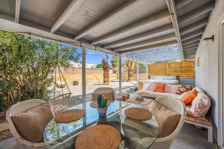 Welcome to your tranquil oasis at 13215 Deodar Avenue in Desert Hot Springs, CA.  Nestled above The Spa Zone, this charming remodeled mid century home features 2 bedrooms and 1 bathroom, spanning 968 square feet of well-designed living space on a generous 0.17-acre lot. Offered Turnkey furnished!As you step inside, you'll be greeted by a tastefully updated kitchen with newer cabinetry . The modern aesthetic continues   contemporary laminate flooring and enhanced lighting, creating an inviting atmosphere. Recently  painted walls, updated baseboards, and new panel doors contribute to a polished and contemporary look.The bathroom has been completely remodeled with a new shower/tub combination, elegant tile work, and an updated vanity and fixtures. Enjoy year-round comfort with a newly installed central heating and air conditioning system. Updated dual pane windows and sliders throughout with an attached 2 car garage and laundry area.The backyard invites you to relax under a covered patio, where you can soak in partial views of the San Gorgonio Mountains, dine al fresco and enjoy your private hot tub. The front yard is beautifully landscaped with desert-friendly plants and a welcoming walkway that enhances the home's curb appeal.Nestled in a peaceful neighborhood, this property provides easy access to local shopping and dining options, as well as the vibrant attractions of the Coachella Valley. Its convenient proximity to Palm Springs Airport adds to the appeal of this serene retreat. For more information or to schedule a private tour, please contact your local real estate expert. Home is an active short term rental, appointment required, do not disturb occupants. Thank you! Now available for long term lease, also for sale. Landlord maintains Gardener, tenant to pay all utilities and maintain hot tub