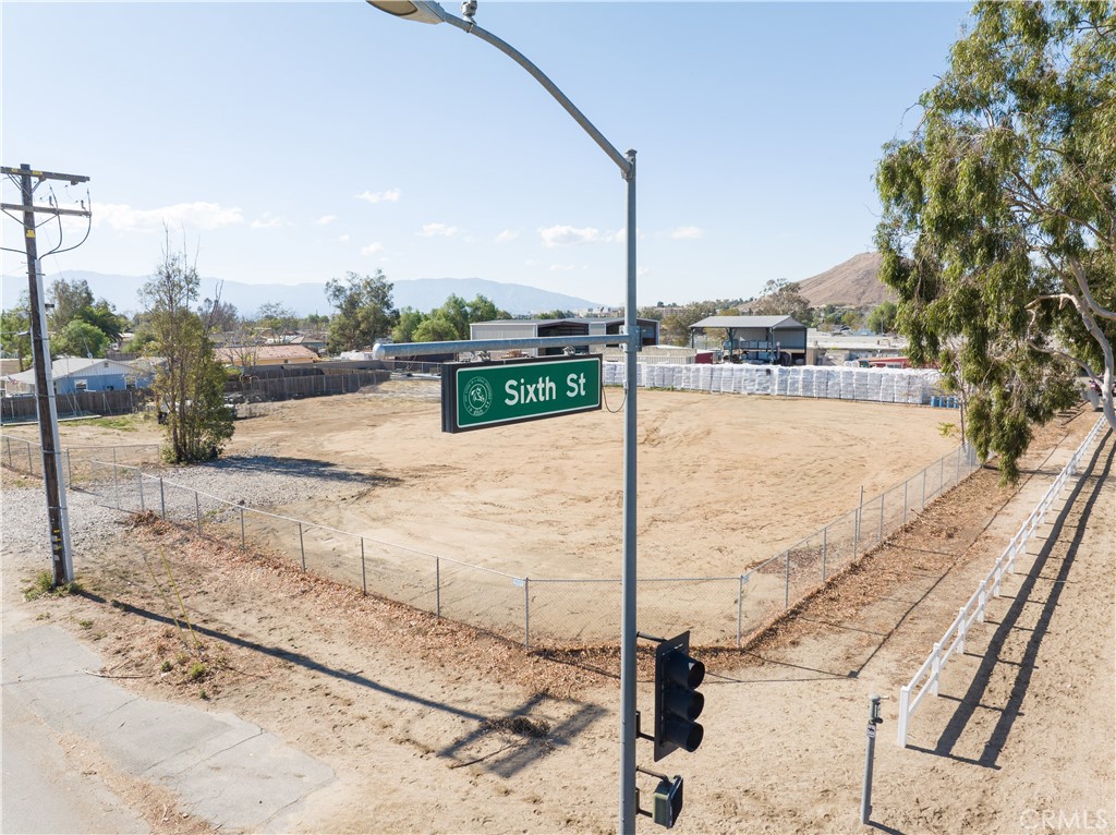 SOUTHWEST CORNER OF 6TH ST AND CORONA AVE. IN NORCO. Flat Corner Commercial C-4 lot with frontage on 6th St and Corona Ave totalling 1.06 acres. Many permitted uses including convenience store/retail, food, animal services/boarding, medical, professional, entertainment, recreational, personal services, and more. Check with local planning to confirm possible uses. 2 blocks from the 15 freeway, surrounded by shops, yards, stores and restaurants on Main-Street, Horsetown USA. 1 mile from Ingalls Park Event Center (Norco Rodeo/Fair Grounds). POSSIBLE SELLER FINANCING AVAILABLE.