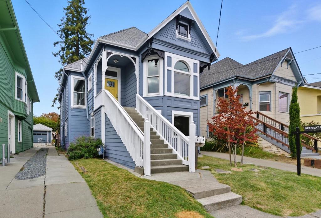 Welcome to 740 59th Street, a beautifully reimagined Victorian duplex offering 2159 sq ft of living space across two fully upgraded residences. With 5 bedrooms and 2 baths, this timeless property perfectly blends historic character with modern sophistication. Ideal for large families, multi-generational living, or smart investors, the home offers the flexibility to live in one unit and rent the other, creating a rare opportunity to build equity while enjoying elevated living. The upper residence 2bd 1ba exudes warmth and charm, featuring two sunlit bedrooms, a formal dining room, and a refreshed kitchen complete with new appliances and soaring ceilings that highlight the homes classic Victorian details. The lower unit 3bd 1ba has been fully revitalized from top to bottom, showcasing brand-new flooring, modern finishes and fixtures, updated countertops, and a complete suite of new appliances. Both residences include stylish bathrooms and in-home laundry for convenience and comfort. Additional highlights include a large attic for storage and a generous backyard with room to entertain, garden, or expand with an ADU. 59th Street is more than a home. It is a lifestyle investment that balances style, comfort, and income potential, ready for its next chapter.