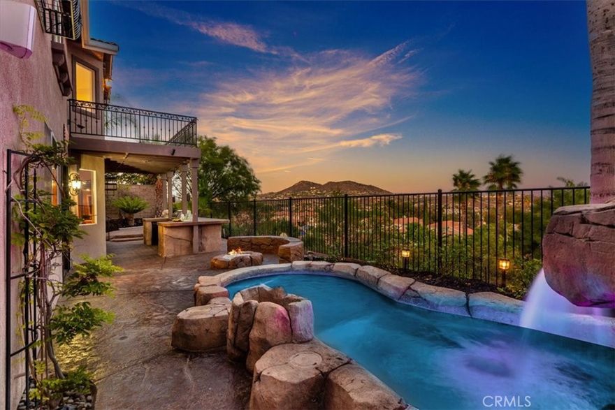 Discover this spacious Corona residence that combines comfort, efficiency, and

sweeping views. According to county records, it shows as a 4 bedroom and

3 bath, but it was originally purchased from the builder as a 6-bedroom, 4-bath

layout —offering flexibility for a guest suite, home office, or multi-generational

living. With a bedroom and full bath on the main level, it’s perfectly suited for

extended family or visitors.

Energy efficiency is built in with fully paid solar panels, helping to keep utility costs

low. The private backyard is designed for entertaining, complete with a built-in BBQ,

relaxing jacuzzi, and ample space to gather with friends and family. From the

upstairs balcony and backyard, enjoy stunning canyon and city-light views.

Ideally located near shopping, dining, parks, and freeway access, this home offers

both comfort and convenience. Don’t miss the opportunity to make this versatile

property your own in one of Corona’s most desirable neighborhoods.