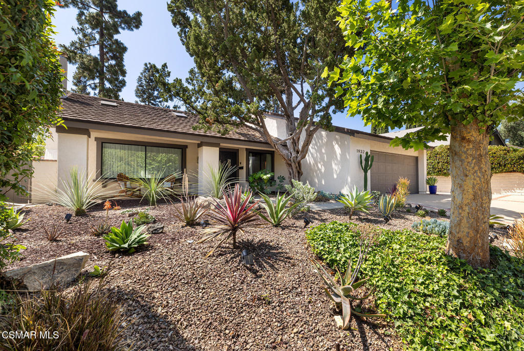 Nestled in the sought-after Oakbrook Highlands neighborhood of Thousand Oaks, this exquisite single-story home blends luxury, comfort, and breathtaking mountain views. With four bedrooms and two beautifully appointed bathrooms, every detail of this residence has been thoughtfully designed for modern living.Step inside to an expansive open-concept layout where the renovated kitchen, dining, and living areas seamlessly come together. At the heart of the home, the chef's kitchen features a generous island, sleek quartz countertops, and premium KitchenAid appliances--perfect for entertaining while enjoying panoramic views of the surrounding hills.The spacious primary suite provides a tranquil escape, featuring sliding doors that open directly onto the serene backyard. The en-suite bathroom and indoor-outdoor flow make this room a true retreat.Outside, your private oasis awaits. Enjoy the professionally landscaped backyard complete with an in-ground spa, a covered al fresco dining area, and plenty of space to relax or host guests in style.The finished garage adds even more flexibility, featuring a versatile recreation area and a large drywalled attic for ample storage.This stunning home offers the ideal blend of elegance, privacy, and natural beauty--come experience the lifestyle you deserve.