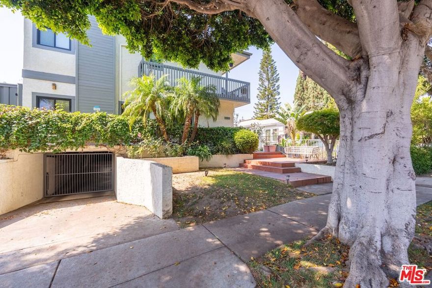 Spacious and bright 2BR+2.5BA townhouse located in the heart of Santa Monica. Newly installed wood floors on the 1st floor showcase the large living area with decorative fireplace, recessed lighting and new glass sliding doors overlooking the patio spanning the width of the unit. Eat-in kitchen has stainless steel appliances, with ample cabinet space and custom cabinets, that leads out to the spacious dining area. The powder room and coat closet complete the first-floor. The second-floor features two en-suite bedrooms including the large primary with high ceilings, walk-in closet and private balcony. Side-by-side laundry room with full-size washer and dryer. Both bedrooms have no common walls. Kinetico water filtration system. Two side-by-side parking spaces with storage unit in gated garage. Boutique 5-unit building that includes earthquake insurance. Would make a wonderful place to call home.