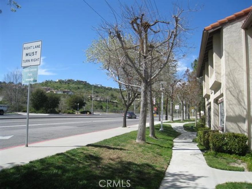 Fantastic REMODELED and UPGRADED END UNIT two story townhome in a great interior location.  This townhome overlooks beautiful greenbelts and pool areas.  There are two large bedrooms each with an ensuite.  The primary bathroom features and huge walk in shower and vanity with double sinks.  The primary suite has two closets, one a walk-in closet and the other complete with custom cubbies, shelves and has a large balcony that overlooks the green  belt and pool areas.  There is a guest bathroom on the lower level and the living room boasts a fireplace, wall sconces and a patio with direct access to the pool area.  There is a separate laundry room with newly replaced washer and dryer.  The remodeled kitchen has a breakfast bar with pendant lighting and quartz counters.  This townhome has recessed lighting throughout and has a conveniently located two car garage just steps from the townhome.  The complex includes two pools and spas, a club house and sauna.  Walk to restaurants and stores and easy access to hiking trails.  Fee shuttle to The Commons and other locations conveniently picked up from the front of the complex.