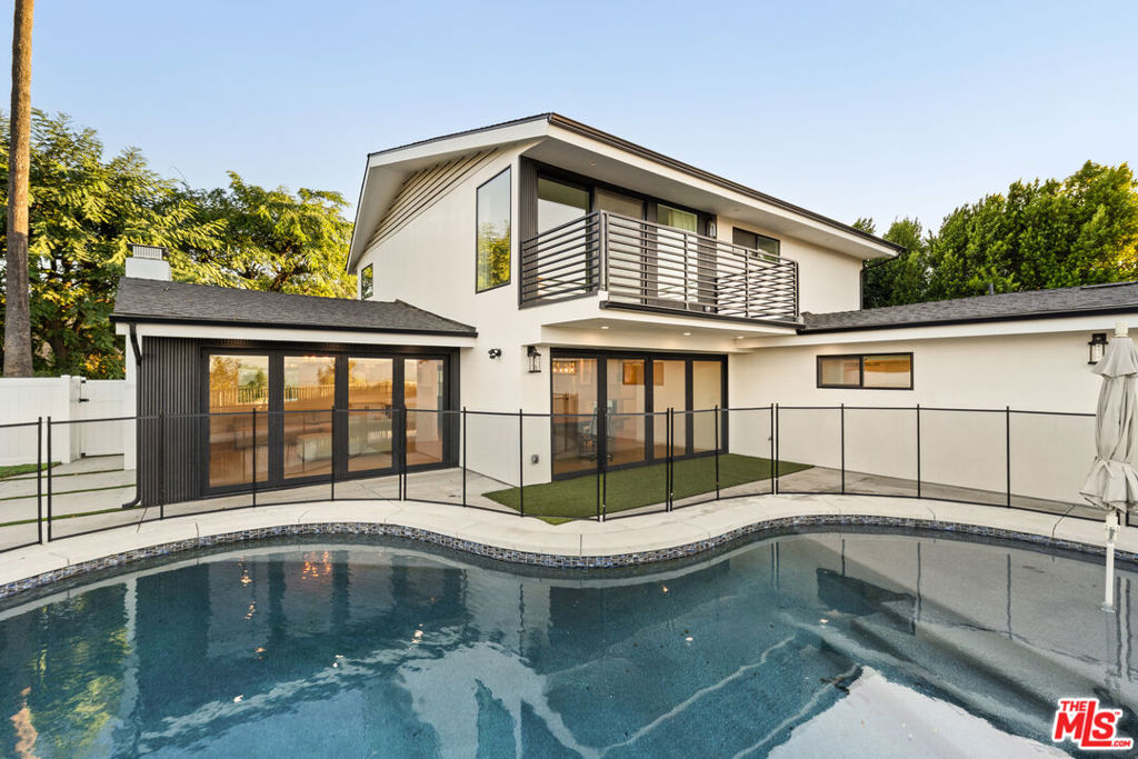 Step into refined living at 15655 Castlewoods Dr, where timeless elegance meets modern sophistication in an idyllic Sherman Oaks location. From the moment you arrive, striking curb appeal and lush surroundings set the stage for a residence designed to impress. This beautifully appointed residence showcases soaring ceilings, expansive windows, and seamless indoor-outdoor flow that elevates everyday living. The gourmet kitchen is a true showpiece, featuring sleek cabinetry, premium appliances, and designer finishes, perfect for both intimate dinners and grand entertaining. The two primary suites are nothing short of sanctuaries, each offering spa-level luxury, designer baths, and a calming, retreat-like ambiance. A private balcony invites sunrise reflections and sunset toasts, while the oversized walk-in closet and spa-inspired bath, with soaking tub, dual vanities, and a picture-window shower, create an elevated daily escape. Additional bedrooms offer versatility for family, guests, or a chic home office. Every detail throughout has been thoughtfully upgraded, blending style with function. Outdoors, a private backyard retreat awaits with lush landscaping and a spacious patio designed for effortless entertaining or tranquil escapes. Nestled in a prestigious neighborhood with easy access to upscale shopping, dining, and top-tier schools, this home embodies the best of comfort and luxury. A rare offering in Royal Woods, this remarkable residence captures the essence of Southern California living, luxury, lifestyle, and spectacular views beyond compare. Minimum 670 credit score and income must be at least 2.5x the monthly rent.
