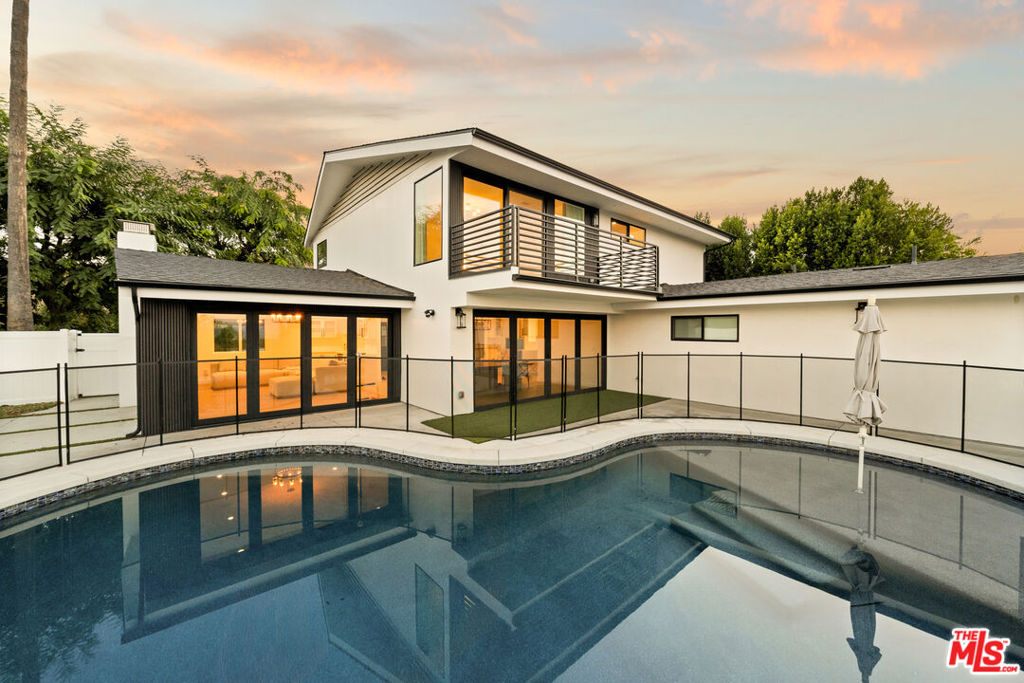 Step into refined living at 15655 Castlewoods Dr, where timeless elegance meets modern sophistication in an idyllic Sherman Oaks location. From the moment you arrive, striking curb appeal and lush surroundings set the stage for a residence designed to impress. This beautifully appointed residence showcases soaring ceilings, expansive windows, and seamless indoor-outdoor flow that elevates everyday living. The gourmet kitchen is a true showpiece, featuring sleek cabinetry, premium appliances, and designer finishes, perfect for both intimate dinners and grand entertaining. The two primary suites are nothing short of sanctuaries, each offering spa-level luxury, designer baths, and a calming, retreat-like ambiance. A private balcony invites sunrise reflections and sunset toasts, while the oversized walk-in closet and spa-inspired bath, with soaking tub, dual vanities, and a picture-window shower, create an elevated daily escape. Additional bedrooms offer versatility for family, guests, or a chic home office. Every detail throughout has been thoughtfully upgraded, blending style with function. Outdoors, a private backyard retreat awaits with lush landscaping and a spacious patio designed for effortless entertaining or tranquil escapes. Nestled in a prestigious neighborhood with easy access to upscale shopping, dining, and top-tier schools, this home embodies the best of comfort and luxury. A rare offering in Royal Woods, this remarkable residence captures the essence of Southern California living, luxury, lifestyle, and spectacular views beyond compare. Minimum 670 credit score.