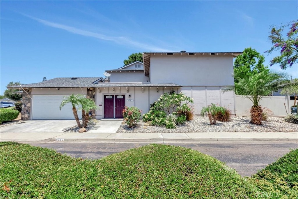 Get ready to fall in love with this amazing home at 6782 Tahitian Cir! A desirable floor plan that is rarely on the market offering a unique and functional layout. Enter through the double doors to a private atrium, ideal for entertaining, gardening or extended living area. Inside you'll find a thoughtfully remodeled 1st level featuring a warm and welcoming open-concept space highlighted with vinyl plank flooring, textured ceilings, recessed lighting, ceiling fan, dual pane windows and sliders. Adjacent to the dining area is a bright and cheery kitchen furnished with crisp white cabinetry, granite countertops, added pantry and includes the refrigerator! Completing the main floor is a charming half bath with pedestal sink, a coat closet and bonus storage space. Upstairs you'll find 2 generous size bedrooms with ceiling fans, mirror wardrobe doors and a walk-in closet. The full hallway bathroom has been tastefully remodeled and is complemented by built-in linen cabinets and shelving. Not only is this a “cool” place to live, but you’ll stay cool year-round with the added whole house fan. Checking off your list of ‘must haves’ is a separate laundry room located off the front atrium/patio along with direct access from the 2-car attached garage. BUT WAIT, THERE’S MORE…Off the dining area is a 2nd spacious rear patio with vinyl fencing and a separate gate access to a lush greenbelt area. Enjoy this expanded private outdoor space - perfect for BBQing, al fresco dining or simply relaxing. The Fairgreen Community amenities offer 3 pools, tennis courts, basketball court, horseshoe, tot-lots and club house- all within steps from this home. A central location to shopping, dining, great schools, freeways, YL Town Center, YL Cultural Art Center and Library. The Fairgreen community is a Planned Unit Development (PUD), not a condo, FHA & VA financing are welcome! Don't miss the chance to own this home. A MUST SEE!