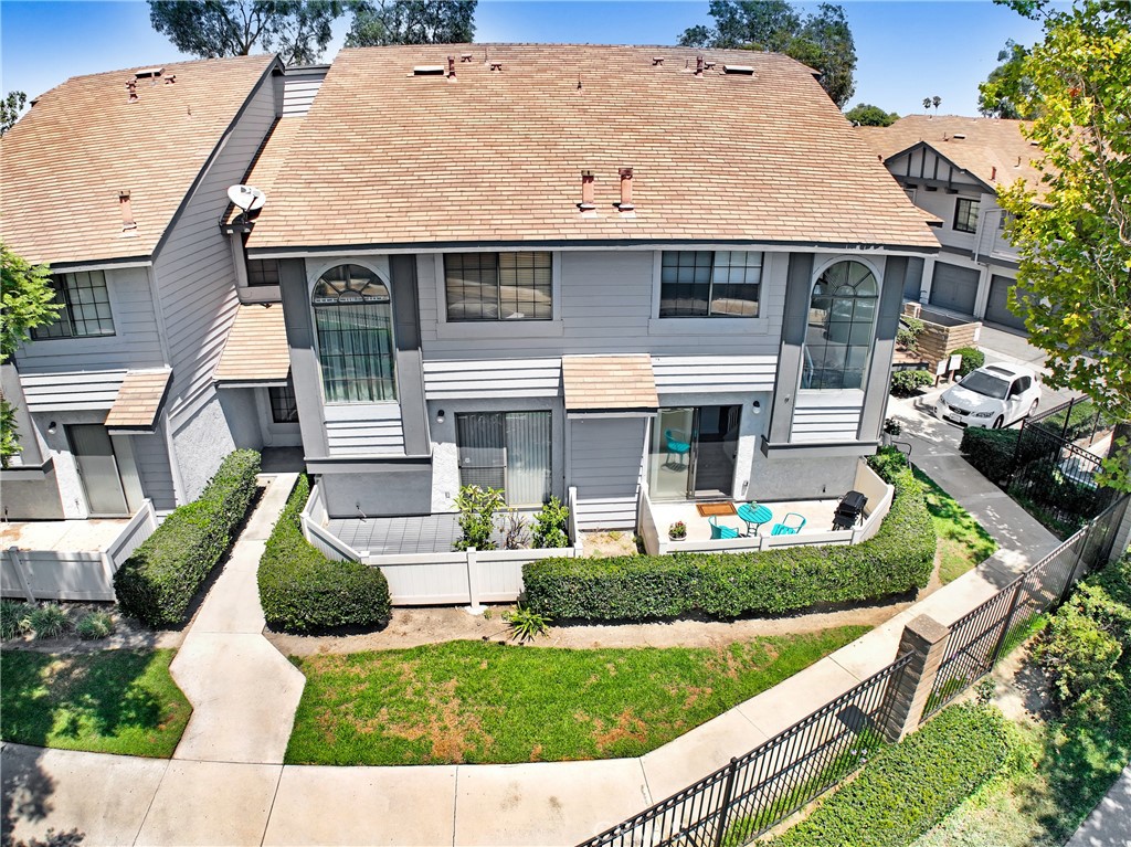 Situated in the sought-after gated Golden Point community, this recently remodeled front-unit condominium offers style, space, and convenience. Updated within the past three months, the two-story layout features 2 bedrooms and 2.5 bathrooms, a bright and open living area, front garden with furniture included and a private patio with furniture included. The interior comes complete with tasteful accessories and appliances, making it truly move-in ready. The attached 2-car garage offers separate doors, direct access into the home, laundry hookups, and a large utility/hobby/workshop space for added versatility. Enjoy the community pool, and take advantage of nearby amenities including a greenbelt just one block away with walking and equestrian trails, plus a bike path leading directly to Shoreline Village, approximately five miles away.