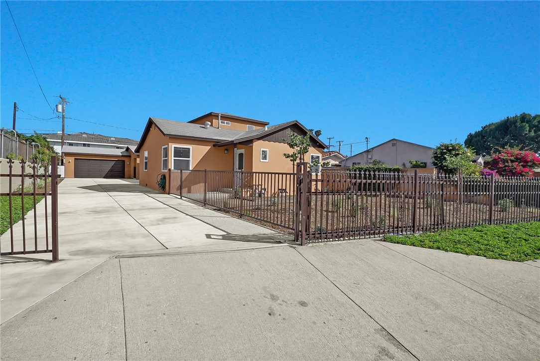 Live in One, Rent the Other — The Perfect Blend of Comfort & Income Potential! This beautifully remodeled property offers a fantastic opportunity for both homeowners and investors. The front home features 1,675 sq ft of updated living space with 3 spacious bedrooms and 2 modern bathrooms. A standout feature is the expansive primary suite complete with a large walk-in closet and private en-suite bathroom. The newly added family room offers the perfect space for entertaining guests or unwinding after a long day. Situated on a generous 7,829 sq ft lot, the property also includes a brand new 749 sq ft ADU featuring 2 bedrooms, 1 bathroom, luxury vinyl flooring, recessed lighting, quartz countertops, and a smart, functional layout. The newly constructed 2-car garage and extended driveway provide ample parking for multiple vehicles. Whether you choose to live in the main home and rent out the ADU to offset your mortgage, or take advantage of the entire property for extended family, this versatile home offers endless possibilities. Don’t miss your chance to tour this turnkey property — schedule a showing today!