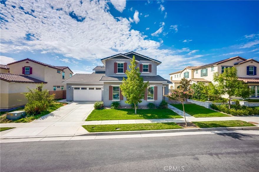 Welcome to this prime location home at Alamo Dr, nestled in gated community of Rancho Etiwanda Estates. This  property has one of the best breathtaking views in the community. Stunning view cover from Los Angeles county San Gabriel Mountains to the South of the Corona and Fontana. Beautiful city light view and fireworks from multi cities in the holiday are watched from balcony and backyard. Home offers 5 bedrooms, 3.5 bathrooms, estimate more than 3700 living sqft. w/central air and heat with recessed lighting, granite countertops, stainless steel appliances, lots of cabinet space for storage, and a center island in the kitchen, also has dual kitchens setup for busy holiday seasons. The bathrooms are upgraded with newer vanities, pedestal sinks and modern light fixtures. The master bedroom provide a comfortable size and comes with dual sinks in the bathroom and a walk in closet. The private balcony on master suite offer a gorgeous view overlooking the city and valley. This gated community is within walking distance of award-winning schools, parks, restaurants, and short drive distance to Victoria Gardens Mall.