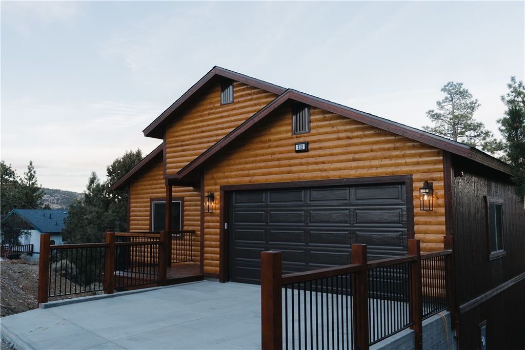 Photo of 212 Mann Drive, Big Bear City, CA 92314 (MLS # JT26056382)