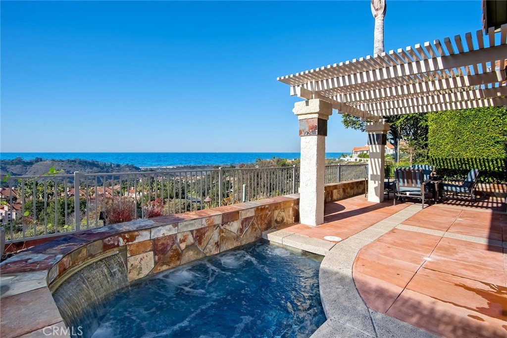 *No Pets. Stunning, BIG PANORAMIC OCEAN VIEWS with your own private, in-ground, ocean view jacuzzi! Open floor plan and low maintenance property with premium upgrades throughout this move-in ready home. A new LG fridge, washer and dryer is included. Home does have A/C. Travertine stone and solid wood flooring, upgraded dual-pane vinyl windows and door sliders, custom closet built-ins, home security camera system, modern lighting fixtures, granite kitchen countertops, plantation shutters and ocean views from multiple rooms. Private in-ground spa with patio cover and a built-in BBQ station. Tons of natural light, two-story ceilings, cozy fireplace in the living room, an upgraded water softener and 2-car garage plus driveway. Bathrooms have been nicely remodeled with stone and modern tile. The master bathroom has dual vanities and a large, walk in shower and large walk-in closet. Enjoy sunsets and ocean breezes on the upstairs view deck. This home is a couple minutes from the beach, SC outlets, plazas, schools and the 5 freeway interstate.