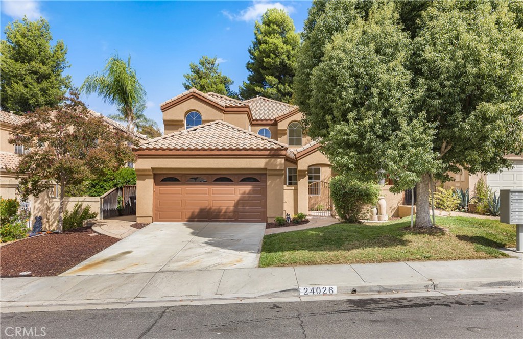 THIS WONDERFUL, MOVE-IN READY 4-BEDROOM, 3 FULL BATH POOL HOME HAS IT ALL! Offering 2,382 square feet of beautiful living area, plus a versatile third car tandem garage space that has been nicely finished and separated from the main garage providing additional living space that can be used as a bonus room, kids playroom, home office, gym or easily converted back to a third garage bay.
The home is pristine, featuring all brand new interior and exterior paint, new vinyl plank flooring, new plush carpeting, new baseboards, and modern lighting fixtures. The remodeled kitchen is stunning with brand new appliances, custom solid wood cabinetry, and granite slab counters. It’s truly move-in ready, just waiting for you to enjoy!
The charming gated front courtyard welcomes you into the home. On the lower level, you’ll find a convenient guest bedroom and full bathroom, large flex space bonus room, light and bright formal living room and formal dining both with soaring ceilings and expansive windows that fill the home with natural light. The remodeled kitchen opens seamlessly to an adjoining sitting area and family room with a cozy fireplace.
Custom iron staircase banisters and a solid wood staircase lead upstairs. The primary bedroom is a sanctuary complete with a spacious bathroom, dual vanities, soaking tub, separate shower and generous walk-in closet. Two additional bedrooms share a full bath, and a conveniently located laundry room makes daily routines effortless.
Step outside to the super private rear yard with the perfect size pool ideal for weekend fun and relaxing evening swims.
Located on a quiet, friendly street in the heart of the Murrieta Valley, walking distance to top-rated Tovashal Elementary and Valley Vista Park. Easy access to the 15 and 215 freeways and minutes to Costco, Target and the Orchard and Vineyard Shopping centers. This home is ready to embrace its next chapter and welcomes its new owners with open arms.