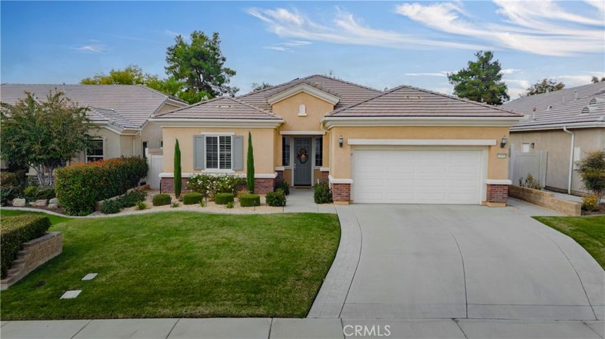Located in the highly sought-after gated 55+ community of Solera at Rio Bravo, this stunning home features 3 spacious bedrooms, 2 full bathrooms, and a rare 3 car tandem garage. Enjoy an open concept layout with beautiful wood flooring, plantation shutters, and a gourmet kitchen with granite countertops, a breakfast bar, and a huge walk-in pantry with custom shelving. The primary suite offers private patio access, a large walk-in closet, and a large bathroom with dual vanities and a walk-in shower. Energy efficient upgrades include solar and a tankless water heater. The backyard is beautifully landscaped and features two covered patios perfect for relaxing or entertaining. Community amenities include a clubhouse, pool, spa, gym, and HOA covered trash service. This home is move in ready. Call for your appointment today!