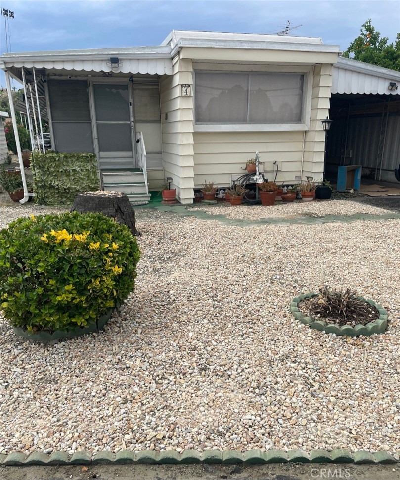 Welcome to Fairview Mobile Home Park Estates, a 55+ community!
This home will give you all the feel good vibes, from the entrance into the long and spacious enclosed patio, on into the living area where this cozy home has new wood floors, and an open floor plan into the quaint kitchen that features a few surprise appliances, and lots of storage space. The bathroom is large and in good condition. The bedroom has many built ins, like a dresser, vanity, and lots of closet space! When you go to the back of the enclosed patio you'll be greeted by a laundry room with enough space for more storage solutions. The carport has a shed for any extras you may have!
The Park has many amenities, including a heated pool and hot tub, a library, a laundry facility, a large clubhouse with a pool table, fire place, a full kitchen, plus they have many community events, potlucks, bingo, holiday parties and more. You're close to many activities like multiple lakes, Soboba Casino and Event Center, Hemet Historical theater and multitudes of shopping and restaurants.
Come live in a RENT CONTROLLED community!