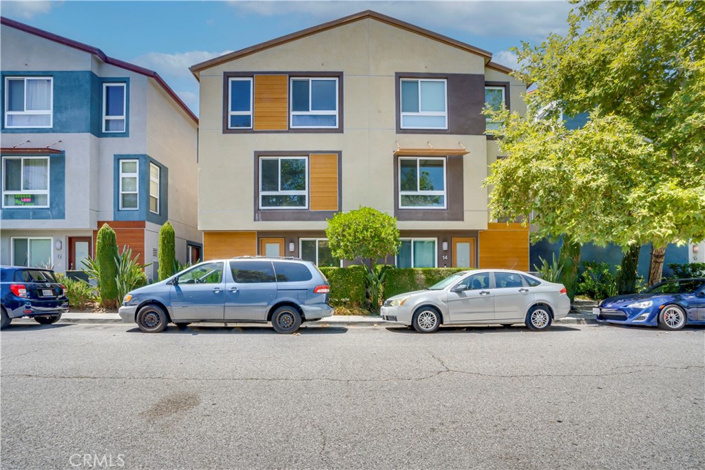 Welcome to 2581 Arvia Street #13, a bright, airy, and modern 4-bedroom, 3-bath end-unit townhome in one of NELA’s most desirable and up-and-coming neighborhoods. With only one common wall, large windows, and high ceilings, this home is filled with natural light. ** Enjoy TWO SEPARTE entrances.** The first floor features a versatile suite ** perfect for guests, in-laws, a gym, or a home office** with ITS OWN ENTRANCE, ensuite bathroom, and terrace opening directly to the community park. The second floor boasts an expansive open floor plan with a light-filled living room, formal dining area, breakfast nook, and a chef’s kitchen complete with stainless steel appliances, ample cabinetry, and quartz counters—ideal for entertaining. Upstairs, you’ll find two spacious bedrooms with a shared full bath, plus a generous primary suite with a walk-in closet and ensuite bath featuring dual vanities and an oversized soaking tub. Additional highlights include abundant storage, a private balcony, dual-pane windows, and a direct-access 2-car garage. Enjoy proximity to Highland Park, Eagle Rock, Silver Lake, DTLA, and Pasadena, as well as easy freeway and public transit access. Just steps away are Rio de Los Angeles State Park, the future G2 River Walk, Frogtown’s pedestrian bridge, and an array of local favorites like La Colombe, Salazar’s, Frogtown Brewery, and more. This vibrant community offers the perfect blend of comfort, style, and convenience.