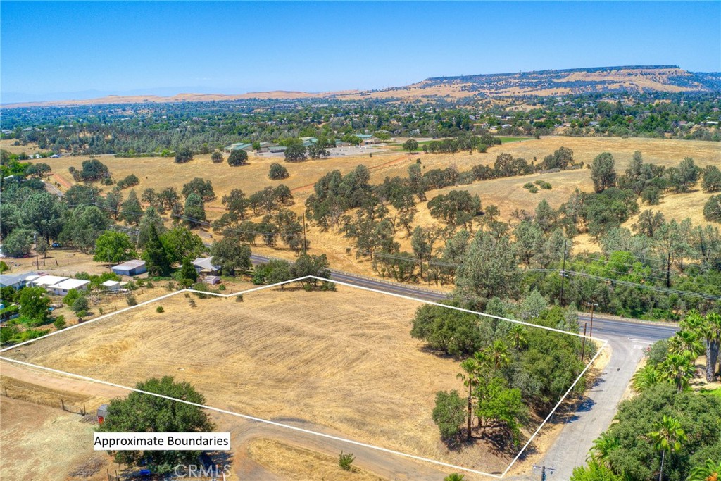 This 2.6-acre lot is in prime location! Located on the corner of Olive Hwy and Kampong Ct, this property is zoned MU-2 according to Butte County's planning department, giving the possibility of a mixture of residential and commercial use. The property sits above Olive Hwy and has an amazing view of Table Mountain! The possibilities for this piece of land are endless.