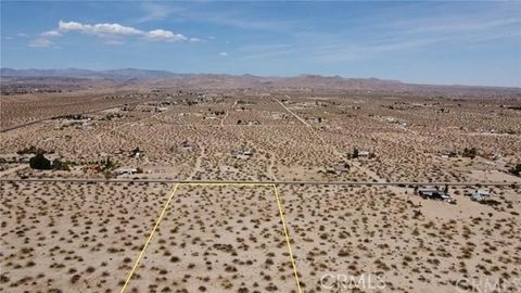 Photo of 1153 Belfield Boulevard, Landers, CA 92285 (MLS # JT25177043) Photo of 1153 Belfield Boulevard, Landers, CA 92285 (MLS # JT25177043)