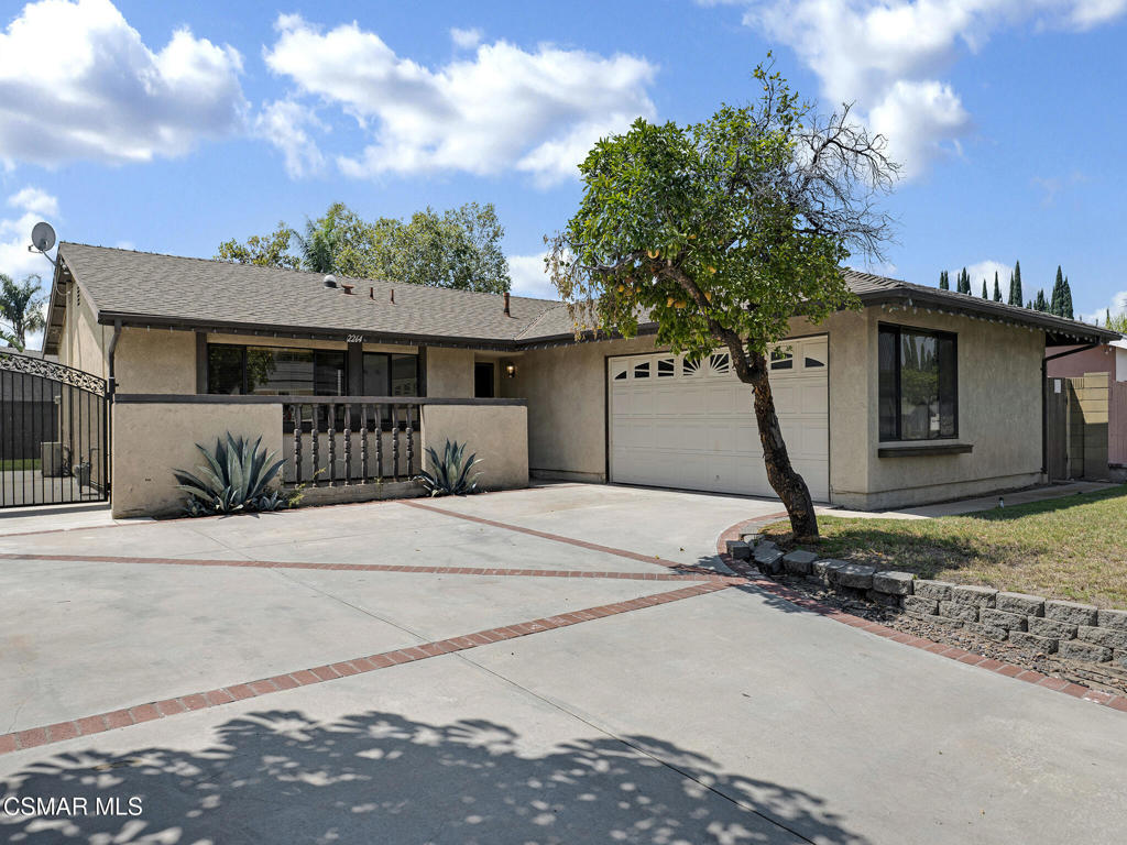 Lovely 3-Bedroom Home with Remodeled Kitchen, Bonus Room & Bright Interior And RV Access! This updated 3-bedroom, 2-bathroom home offers 1,205 sq ft of living space, plus a spacious enclosed patio perfect for a family room, game room, or flex space--featuring large ceramic tile flooring and a ceiling fan (not included in square footage). The remodeled kitchen includes white appliances, a stainless steel oversized sink, abundant counter and cabinet space, pull-out pantry drawers, a breakfast bar, recessed lighting, and additional track lighting.The open-concept layout flows into the dining area, where sliding glass doors lead to a covered patio Which leads to a nice size backyard. Inside, upgraded waterproof laminate flooring runs throughout most of the home, with ceramic tile in the living room and the enclosed patio. A tubular skylight in the living room and a hallway skylight bring in natural light, complemented by recessed lighting and ceiling fans in most rooms. Smooth Ceilings throughout.The primary bedroom features a private en-suite bathroom with a standing shower, and one of the secondary bedrooms includes mirrored closet doors. Both bathrooms have been tastefully updated. The house has Central Air conditioning and Heating and a very spacious attached 2 car garage with many cabinets for storage and direct access into the kitchen.Outside, enjoy great curb appeal with a concrete driveway accented by brick, a wrought iron gate, and concrete RV access. Centrally located near schools, shopping, dining, and easy freeway access for commuters--this move-in ready home offers comfort, convenience, and versatility! Plus Enjoy Living in the Mountain Valley Development with Access to the Community Pool, Tennis Court ,Private Park, Volley Ball Court and Club House.