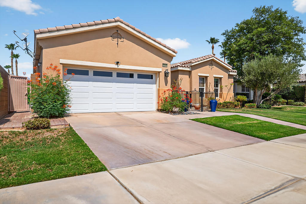 Welcome to this stunning 3-bedroom, 2-bathroom unfurnished home! It is the perfect blend of comfort and desert elegance and is available now for a 1-year lease. Step inside to discover a spacious, light-filled living area with soaring ceilings and large windows. The open-concept kitchen features modern appliances and ample counter space, ideal for both everyday living and entertaining.Enjoy the privacy of a generous primary suite with an en-suite bathroom and walk-in closet, while two additional bedrooms offer flexibility for guests or a home office. The backyard is your personal oasis--perfect for relaxing under the stars or hosting weekend barbecues.Located in the desirable 55+ Trilogy community, you will have access to great amenities like tennis, pools, spa, bocce ball, fitness center and much more. Don't forget to stop by the onsite restaurant for a tasty bite to eat.Don't miss your chance to live in one of La Quinta's most sought-after neighborhoods and experience desert living at its finest!