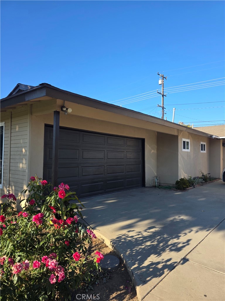 Welcome to this beautifully remodeled single-story residence featuring three spacious bedrooms. The home boasts a large driveway with ample parking, perfect for families and guests. There is a separate house ADU behind this house.