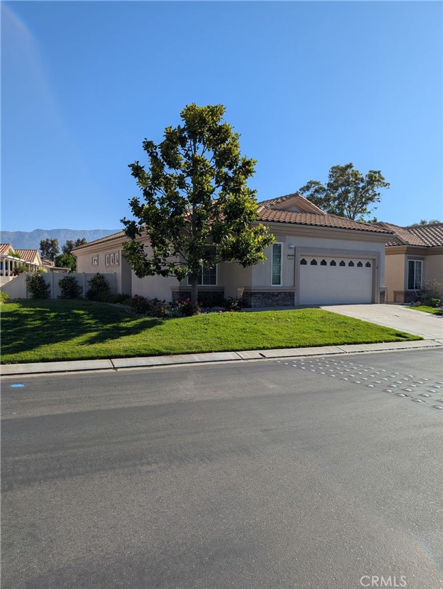 SUPER BUY!  SHARP, ENERGY EFFICIENT PULTE BUILT 2003 "PAVE" Model, Perfectly Located on the Executive Golf Course with PANORAMIC GOLF COURSE AND MOUNTAIN VIEWS, IN Beautiful SUN LAKES COUNTRY CLUB, SO. California's Premier 55+. Active Adult Community. Featuring: Approx. 1471 SF, 2 BD + Den, 2 BA, New NEX GEN AIR CONDITIONING & HEATING SYSTEM & THERMOSTAT ($14,608) Desirable Floor Plan w/Open Kitchen, French Door Refrigerator/Washer/Dryer Included, Great Room Concept w/Built In Entertainment Center, Ceiling Fans, CUSTOM WINDOW TREATMENTS ($5,246), Neutral CERAMIC TILE FLOORING/CARPET in Bedrooms, CUSTOM LANDSCAPING w/RIVER ROCK -  SIDE YARD W/DROUGHT RESISTANT PLANTINGS ($11,090) - FRESHLY PAINTED EXTERIOR -  All this and a Stunning View to boot! EASY WALKING DISTANCE TO THE NORTH CLUBHOUSE, BOCCEE BALL COURTS, SWIMMING POOL. Amenities Include: Two 18 Hole Golf Courses - Championship & Executive, Driving Range, 2 On Site Golf Pro Shops, 3 Clubhouses, Grand Ballroom, 2 Restaurants, NEWLY EXPANDED & REMODELED LOUNGE, Indoor & Outdoor Pools, Bocce Ball, Tennis, Pickle Ball, All Types Of Clubs & Events - Endless Opportunities For New Friendships. PLUS NO MELLO ROOS! AT SUN LAKES COUNTRY CLUB -EVERY DAY FEELS LIKE A VACATION!