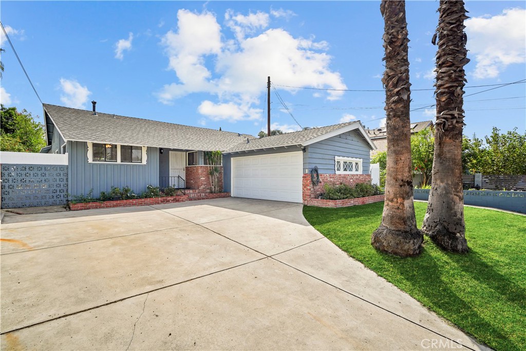 Exceptional Opportunity in Prime North Hollywood -4BD/ 2.5BA. this North Hollywood gem is the perfect opportunity for first-time buyers, savvy investors, or anyone looking to move up from a smaller home. Offering 4 bedrooms and 2.5 bathrooms across 1,604 sq ft of living space, this residence sits on a generous 6,551 sq ft lot, combining comfort, value, and future potential. Inside, you’ll find a bright open-concept layout featuring new stainless steel appliances, central air/heat, a classic fireplace, an updated bathroom, mirrored closet doors, a full primary suite, and a dedicated office—ideal for today’s lifestyle needs. The home’s solid structure and timeless charm provide a move-in-ready foundation with endless possibilities for upgrades or customization. Additional highlights include: an updated electrical panel, fresh interior paint, and a private backyard with a covered patio—perfect for entertaining, summer gatherings, or even future expansion. Located on a quiet street with close proximity to top schools, the NoHo Arts District, studios, dining, and major commuter routes, this property delivers the ideal blend of lifestyle and long-term value. Whether you’re purchasing your very first home, upgrading to more space, or investing in one of LA’s fastest-growing neighborhoods—this is an opportunity you don’t want to miss.