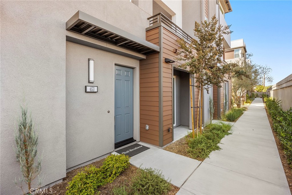 Discover the perfect blend of luxury, convenience, and contemporary design at 717 Lyon, a gated Toll Brothers community in the vibrant city of Santa Ana. Built in 2025, this stunning 3-bedroom, 2.5-bathroom townhome spans 1,564 sq. ft. and showcases the superior craftsmanship and modern elegance Toll Brothers is known for. Step inside to find a flexible ground-level office or bonus room, ideal for working from home or creating your own personalized space. The main level features an open-concept kitchen and living area highlighted by stainless steel appliances, a spacious kitchen island, and a cozy breakfast nook, perfect for everyday dining or entertaining guests. Enjoy the convenience of a direct-access two-car garage, washer and dryer included, and a tri-level layout that balances privacy and functionality. Outside your door, experience the best of Orange County living—just minutes from downtown Santa Ana’s historic district with trendy restaurants, local shops, and cultural attractions. World-class beaches, major employment hubs, and John Wayne Airport are all within easy reach. With its central OC location, access to the Tustin Unified School District, and limited final opportunities to own, this residence offers an unparalleled lifestyle in one of the region’s most dynamic communities.