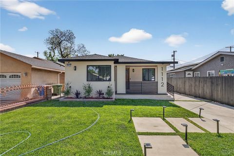 Photo of 1112 E 102nd Street, Los Angeles, CA 90002 (MLS # DW26067046)