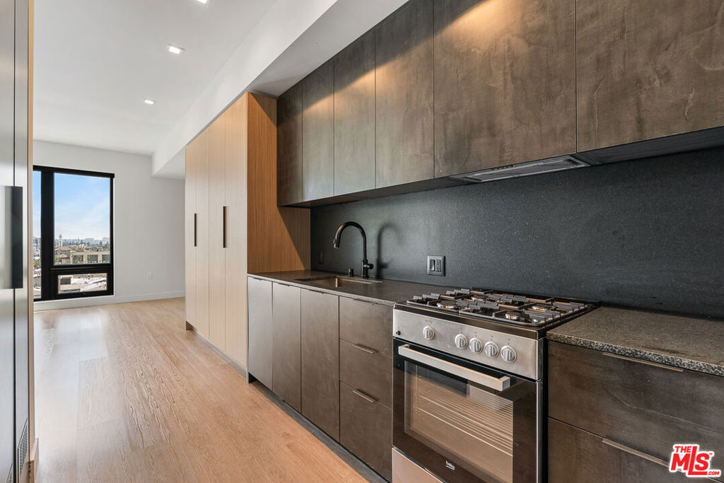 Welcome to Arya. Located in the Palms/Culver City neighborhood, this is the newest property within the Helio portfolio. This studio floor plan is available on the 2nd floor, with South facing views of the city. At 504 sf and a full kitchen, you have the space for a living room seating area, small dining table, and bedroom set. Kitchen has dark finishes with granite countertops, stainless steel appliances including dishwasher, fridge, and gas oven/stove. Residence includes a custom closet system, electronic blackout window shades, and smart lights. Property uses Latch OS for smart access using your phone. Property amenities include fitness center with Technogym equipment, co-working lounge, a conference room, and spacious rooftop with 2 BBQs, lounge seating, games and exceptional city views. Off-site parking available for $125/month, and internet at $84/month. Contact us today to schedule your tour!