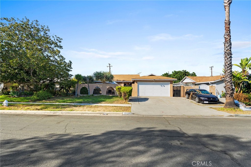Welcome to this spacious 4-bedroom, 2-bathroom home that offers comfort and functionality in one of Santa Ana’s most highly desirable neighborhoods. Featuring a spacious floor plan, the home includes an additional family room perfect for gatherings, a 2-car garage, and plenty of natural light throughout. The inviting layout provides ample living space for both relaxation and entertaining. Conveniently located minutes from schools, Disneyland, the Outlets of Orange, and the 22 Freeway, this home is a fantastic opportunity for anyone looking to settle in a sought-after community.