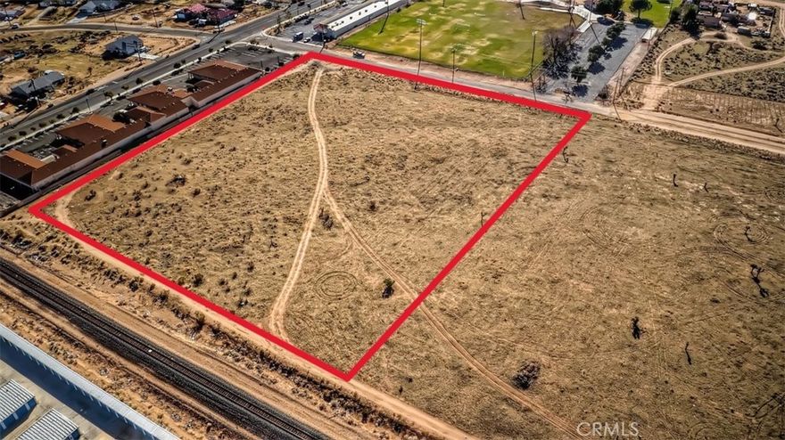 Potential rail access on north property line. Paved road and 172 ft from the corner of Live Oak & I Ave. This is an exceptional value and is ready to build. I Ave is a major north/south artery, connecting Hesperia to Victorville and Apple Valley. Access Type: Public Access Industrial Lot