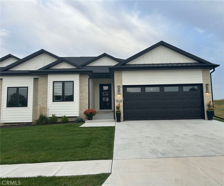 Preserve Hillcrest Community - Attached Townhome with open Concept Main Level, beautiful gas
Fireplace, luxury vinyl plank flooring, quartz countertops, custom cabinets and stainless steel
appliances. Mud room/ Laundry with built in drop zone area. Large daylight basement with 9+ Foot
ceilings, large great room, wet bar, bathroom and 3rd bedroom. Extra 10x12 foot enclosed room for
storage, exercise or craft room. Lots of storage. HOA amenities cover lawn care, snow removal and
garbage service.