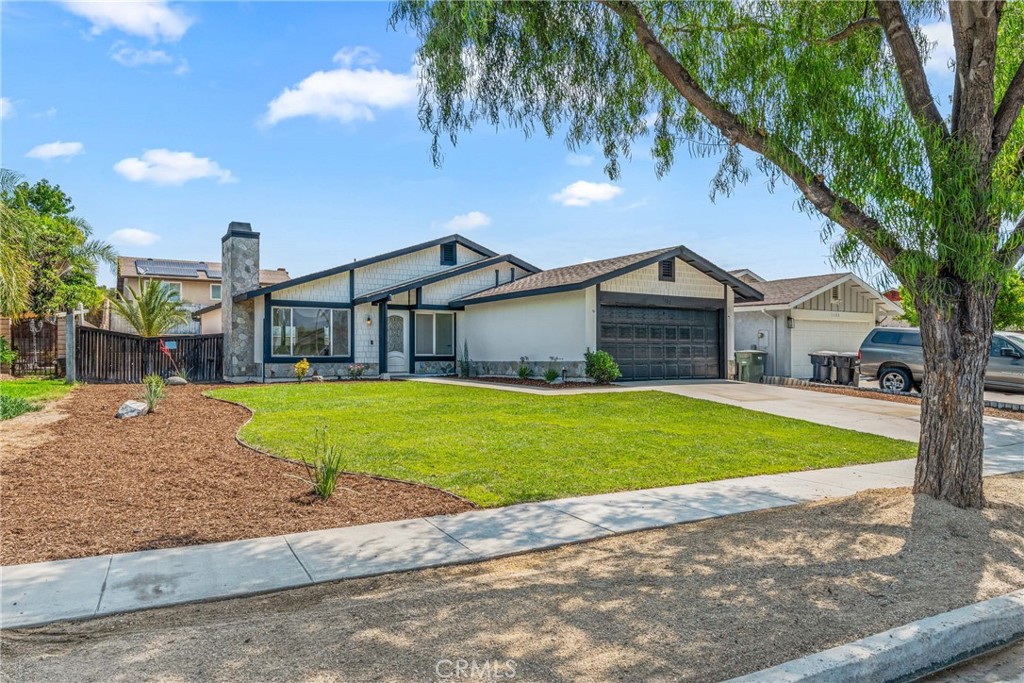 Welcome to 1157 Fallbrook Dr a turnkey single-story pool home with breathtaking futures, ready for you to move in! With a bright and open floor plan spanning 1,440 square feet, this home features four spacious bedrooms and two full bathrooms. As you arrive at 1157 Fallbrook Dr, you'll be captivated by its impressive curb appeal. Every inch of this home has been beautifully upgraded and lovingly maintained. Upon entering, you'll find a spacious family room, living room, and dining area, perfect for entertaining, complete with a cozy tile fireplace. Step into the chef’s kitchen, where quartz countertops, stainless steel appliances, and crisp white cabinetry create an inviting culinary space. The bathrooms are tastefully designed with upgraded countertops, elegant cabinetry, modern fixtures, and stylish tile, ensuring a luxurious feel. Set on an expansive 6,970 square-foot lot, the resort-style backyard is a true oasis. It boasts a sparkling pool, Patio ideal for entertaining. Imagine unforgettable BBQs with family and friends while enjoying breathtaking sunset views. Additional highlights include Fresh paint, luxury vinyl flooring throughout, high ceilings, recessed lighting, and energy-efficient windows promoting comfort and style. Best of all, you can enjoy this amazing home without any "Mello-Roos fees or HOA restrictions!" Don’t miss out—schedule a visit today to experience this magnificent home for yourself!