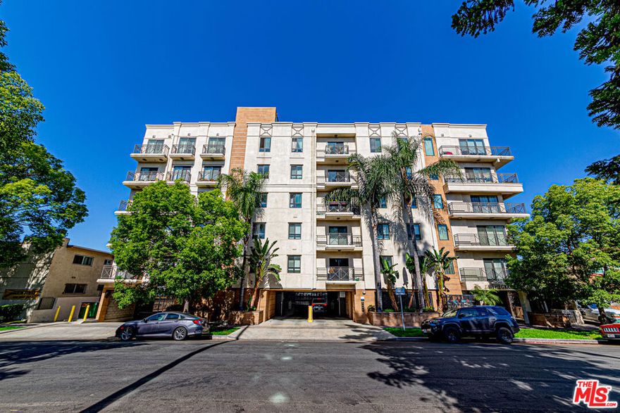 Welcome to a beautiful 3-bedroom, 2-bathroom condo nestled within the heart of Hancock Park! This residence offers a harmonious blend of modern luxury and timeless elegance, situated in one of Los Angeles' most vibrant neighborhoods. Tuscany style Condo, Penthouse Corner unit, no common wall, 270 degree views of  LA's downtown skyline, and more! Condo sits on the Top 6th floor/ Penthouse of a well-maintained, secure building and offers a perfect blend of comfort, convenience, and classic charm. Hardwood floors, large windows, and sweeping views. Private storage room and 2 penthouse privileged ground parking spaces with 220 Volt electric charger.  Hancock Park and Larchmont Village adjacent, Bright & Airy, Located in one of LA's most sought-after neighborhoods, just minutes from Larchmont Village, The Grove, Koreatown, and an array of dining, shopping, and cultural hotspots. Low HOA dues and located in 3rd Street Elementary District. Come by see...Don't want to miss this one!