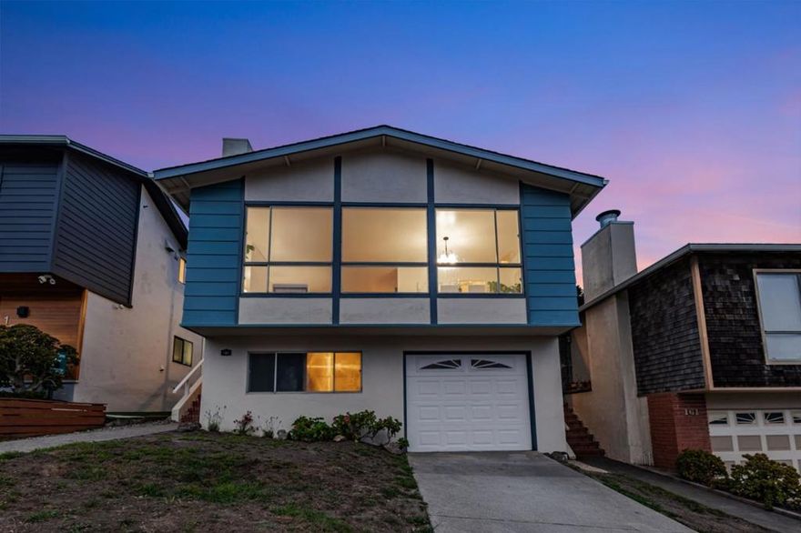 Westlake Terrace suburbs by the sea with neighborhood expansive ocean and coastline mountain views.  A warm and welcoming home with large windows and open floor plan to maximize views and natural light with refreshed solid hardwood floors.  Light and airy living room with dining area evoke a seaside feel with a light color palette throughout to create a warm and relaxed environment. Center your conversation around a warm fireplace and unwind at the end the day in the living room. Cozy up in the refreshed and all-white kitchen with painted wood cabinets, light colored vinyl floors, and white appliances.  Each spacious bedroom is refreshed with new paint and refinished hardwood floors and all bathrooms are refreshed providing enhanced property appeal with new tile, vanities, mirrors, lighting, faucets, and toilets.  Inviting primary bedroom has a vanity area with a sink, separate stall shower, and views of the backyard terraced garden.  Refreshed downstairs space is a surprise with a large 4th bedroom, living area with new vinyl plank flooring, new closet doors, with updated 3rd bathroom. Retreat to the refreshed backyard beckoning you to sit by a fire pit on the pretty brick patio while admiring the attractive, terraced gardens.  We welcome you to your home sweet home by the sea.