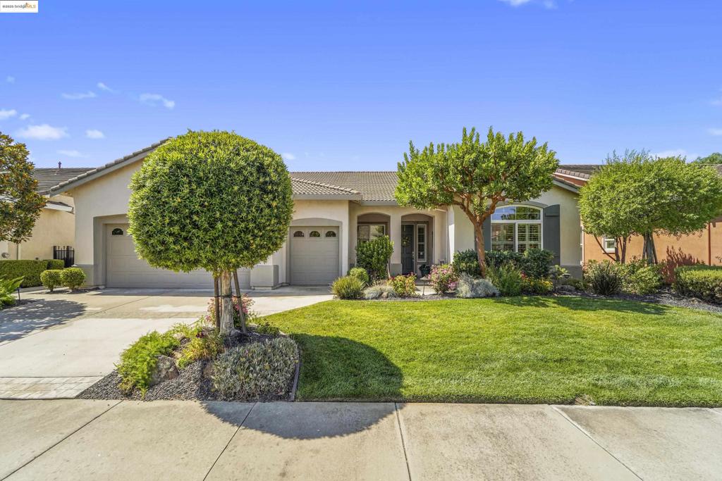 Welcome to this beautifully maintained home in the desirable Summerset IV where resort style living meets everyday comfort. Custom touches throughout. This spacious home boasts Formal living and dining room. Large chefs kitchen with lovely granite countertops ,built in appliances, bar seating, a walk-in pantry and plenty of prep space, cozy nook area with custom cabinetry. All opening up to family room with fireplace. Office with built in desk, cabinets, organized and ready for work! The oversized Master Bedroom has custom paint creating a calm relaxing retreat. Dual vanities in master, separate stall shower and large walk-in closet. Lovely Guest in-suite with privet bath. Step outside to your private landscaped backyard. Enjoy the views of the golf course and tranquil water features while sitting under your covered patio. Don't miss this luxurious move-in ready home in one of Brentwood's most sought after Active Adult Communities.