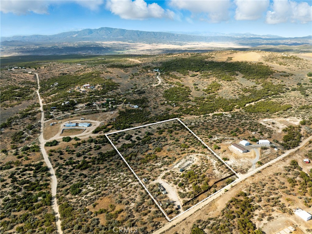 Discover an extraordinary opportunity to own fully fenced and improved 4.8 acres in the scenic hillsides of Upper Aguanga. This private and mostly usable parcel offers panoramic views and endless possibilities, all while being just 40 minutes from Temecula or Idyllwild.
The property features a private well with pump and pressure tank (installed in 2006), electricity on site, and newer fencing already in place. Zoned R-A-5, it's an ideal setting for a custom home, horses, animals, gardens, or a small ranch.
Enjoy the peace and privacy of rural living with the convenience of accessibility. Whether you're ready to build now or invest for the future, this is a rare opportunity to own a beautiful piece of Southern California countryside.