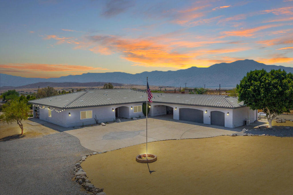 Custom-Built Desert Retreat with Panoramic Views. Experience the perfect blend of space, privacy, and modern upgrades in this stunning custom-built home, nestled in the wide-open beauty of Sky Valley. Offering approximately 3,110 sq ft of living space, this residence features 3 bedrooms, 4 remodeled bathrooms, plus a versatile bonus room with its own entrance--ideal as an attached Casita, 4th bedroom, private office, or studio. Set on a 1.25-acre gated and fully fenced lot, the home is designed for both comfort and functionality. Inside, the vaulted ceilings, open floor plan, custom wood wall accents, crown moldings, and stylish barn doors create a warm yet elevated atmosphere. The gourmet kitchen with floating island is perfect for entertaining, while the primary bedroom offers an oversized walk-in closet/dressing room for a true retreat feel. Every bathroom has been tastefully remodeled, while newer zoned HVAC systems ensure year-round comfort. A large utility room with washer and dryer adds everyday convenience. From both the interior and the expansive outdoor spaces, enjoy panoramic mountain and desert views that capture the essence of desert living. Step outside to an inviting raised deck with a firepit and spa, the perfect setting to relax, entertain, or stargaze under desert skies. Car enthusiasts and hobbyists will love the air-conditioned 3-car garage plus carport, offering ample storage and workspace. The property provides endless opportunities for outdoor leisure--with plenty of room to add a pool, tennis court, putting green, or entertaining pavilion--all while maintaining a highly private setting. This Sky Valley sanctuary blends modern upgrades, versatile living spaces, and luxury finishes with sweeping mountain and desert views. Just a short drive to downtown Palm Springs--but far enough away to embrace the serenity of the desert--this home is the ultimate retreat where style meets tranquility.