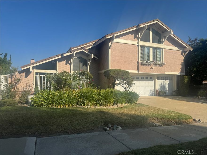 This 6 Bedrooms + 3 Baths home with almost 2,900 sq.ft. is located in a great area of Upland.  Double-door entry with spacious Living room with high ceilings, recessed lighting, fireplace, & formal dining area.  Main floor Bedroom + Bathroom.  Large Family room with fireplace attached to the kitchen, feels like a Great Room.  Kitchen with lots of cabinet space, dining area, lots of possibilities.  Master Bedroom suite with his & hers closets, sinks, enclosed balcony/sunroom, & balcony.  4 additional bedrooms & 1 Bathroom in the hallway upstairs.  Also, you’ll find many windows that have plantation shutters.  Only minutes away from the 210 Freeway & shopping.  Great location, won’t last!!